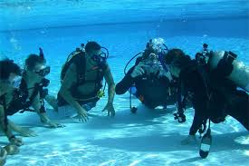 Some Off The Wall Divers enjoying training to dive in the Grand Caymans